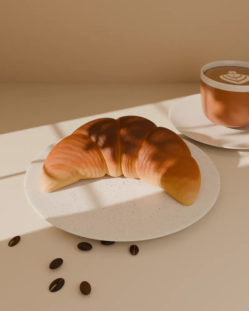 A brown-butter croissant on a speckled plate.